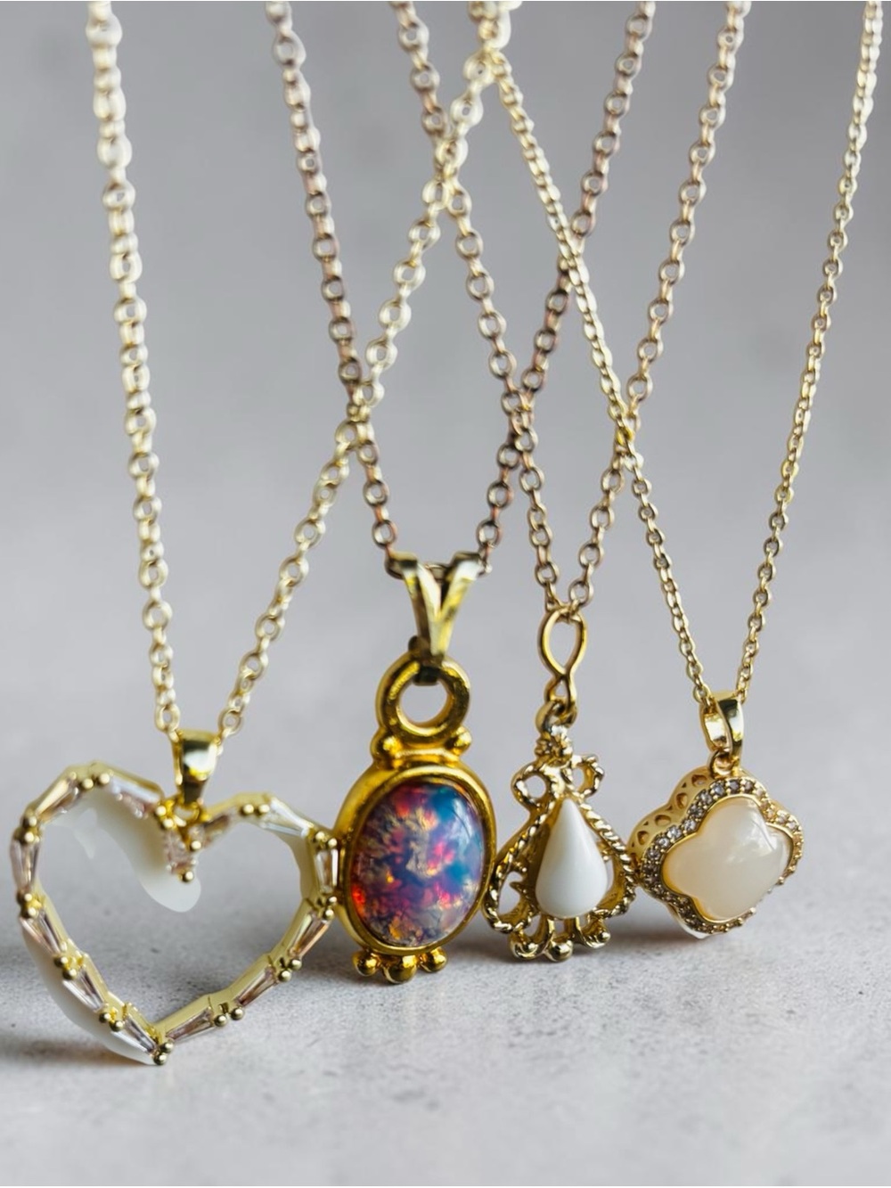 4 necklaces assorted (heart, iridescent, tear drop, and VC dupe)